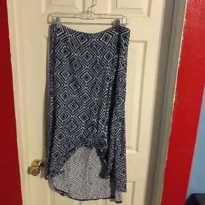 Skirt in a soft blue and white polyester blend.